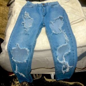 Denim jeans with holes